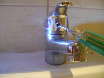 unscrew_bathroom_faucet.JPG